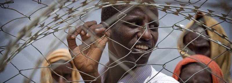 Somali refugees wait to register at the Dadaab refugee camp in Kenya [© Kate Holt/IRIN]